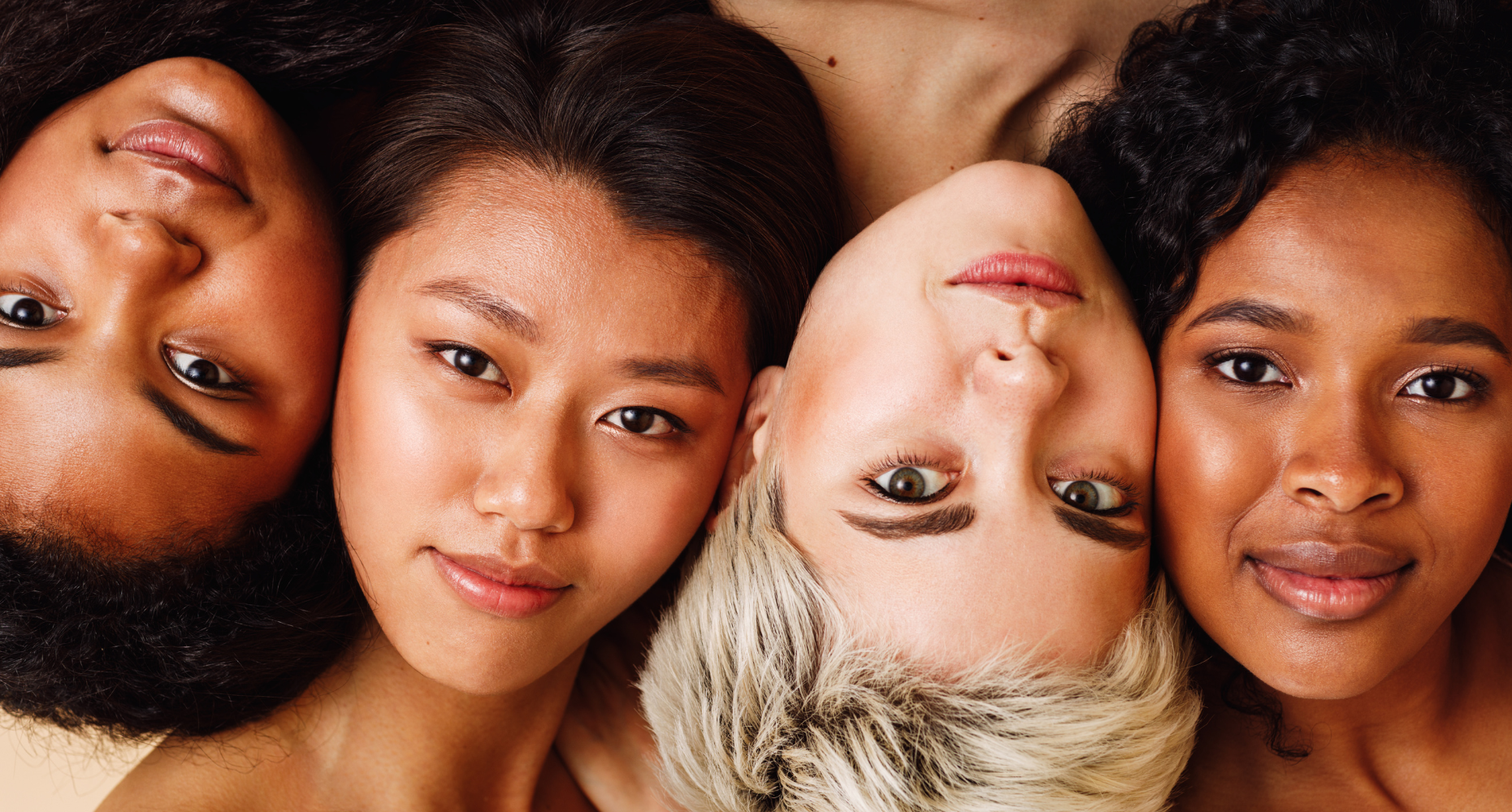 Four women with diverse skin tones